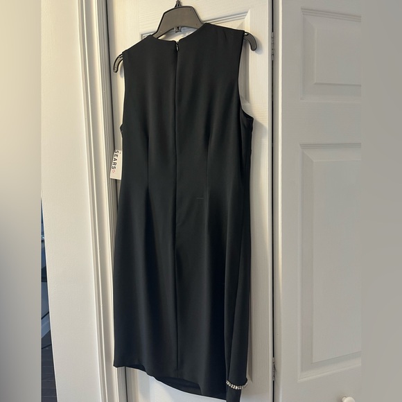 Black alone dress with bejeweled edging. New with tags from Sears. - Picture 2 of 3